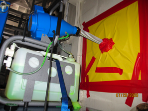 Remote delivery via hot cell manipulator port.